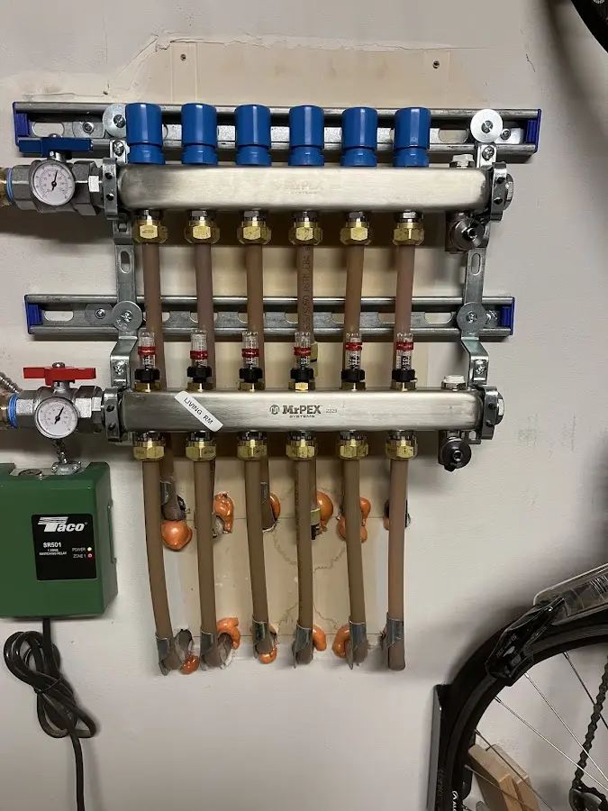 Plumber performing Gas Line Installation at a residential property in West Springfield Town